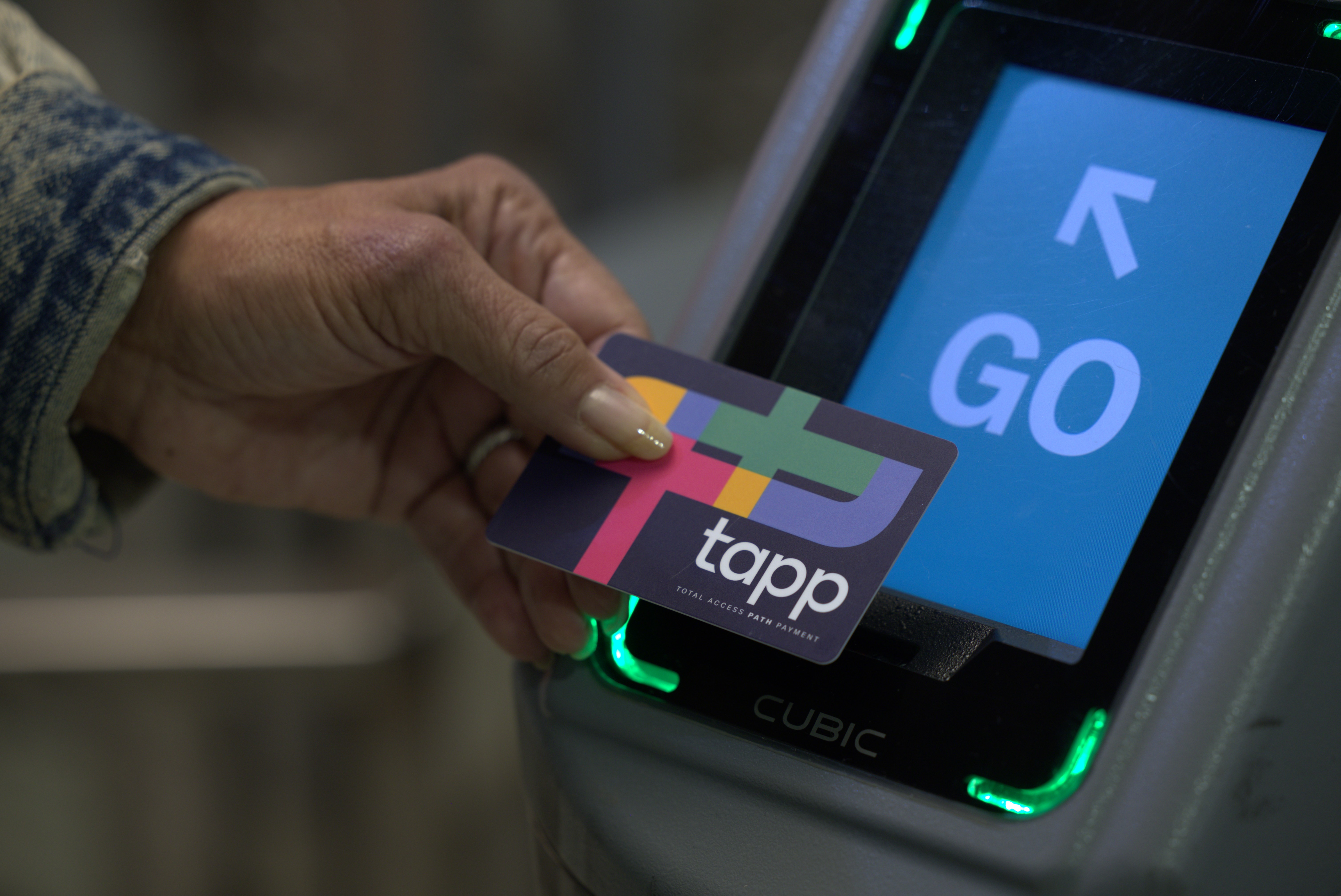 TAPP Card presented at a TAPP reader (TAPP-accepting turnstile). 